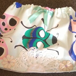 RSPCA Op Shop - New baby skirt decorated with doilies.