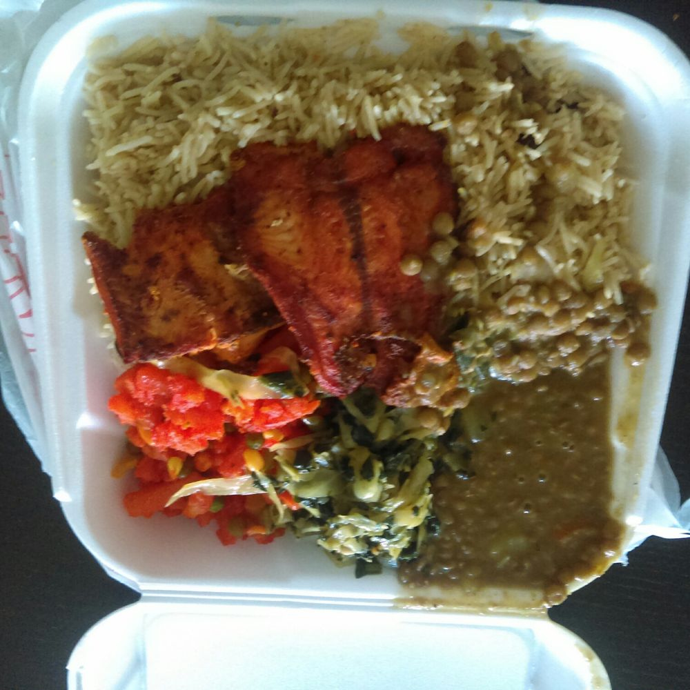 Mogadishu Restaurant - Salmon with rice, vegetables and lentil soup - African Near Me - Chicago, Illinois Mogadishu Restaurant - Salmon with rice, vegetables and lentil soup - African Near Me - Chicago, Illinois