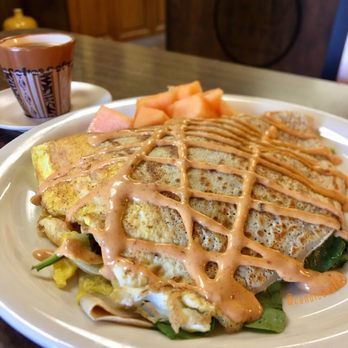 Wholly Crepe - Bacon and Egg Breakfast Crepe Bacon, cheddar jack, spinach, onions, cracked egg, avocado and topped with chipotle sauce - Creperies Near Me - Poway, California