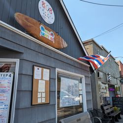 Menehune Murph's - Front of building in between 2 bars on Portland Ave