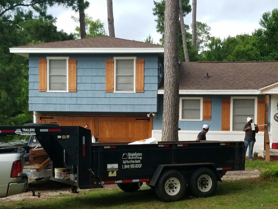 Slide of ShingleMasters Roofing