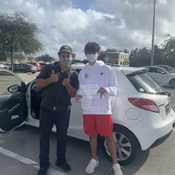 ZG Driving School - Frank & my son after an awesome lesson & after passing the DMV exam with flying colors!!! Highly recommend him & this driving school!! - Driving Schools Near Me - Weston , Florida