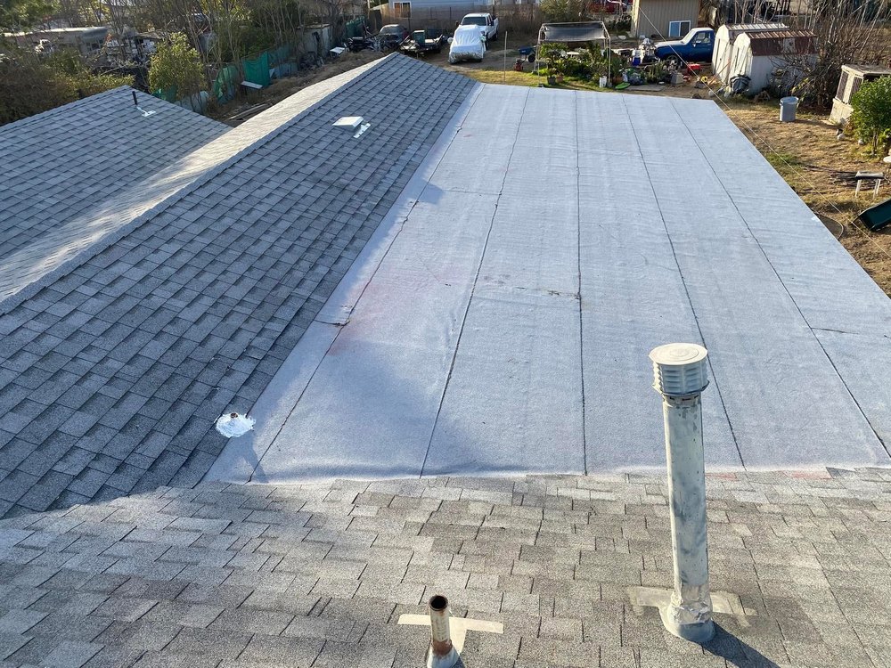 Slide of Tolenco Roofing