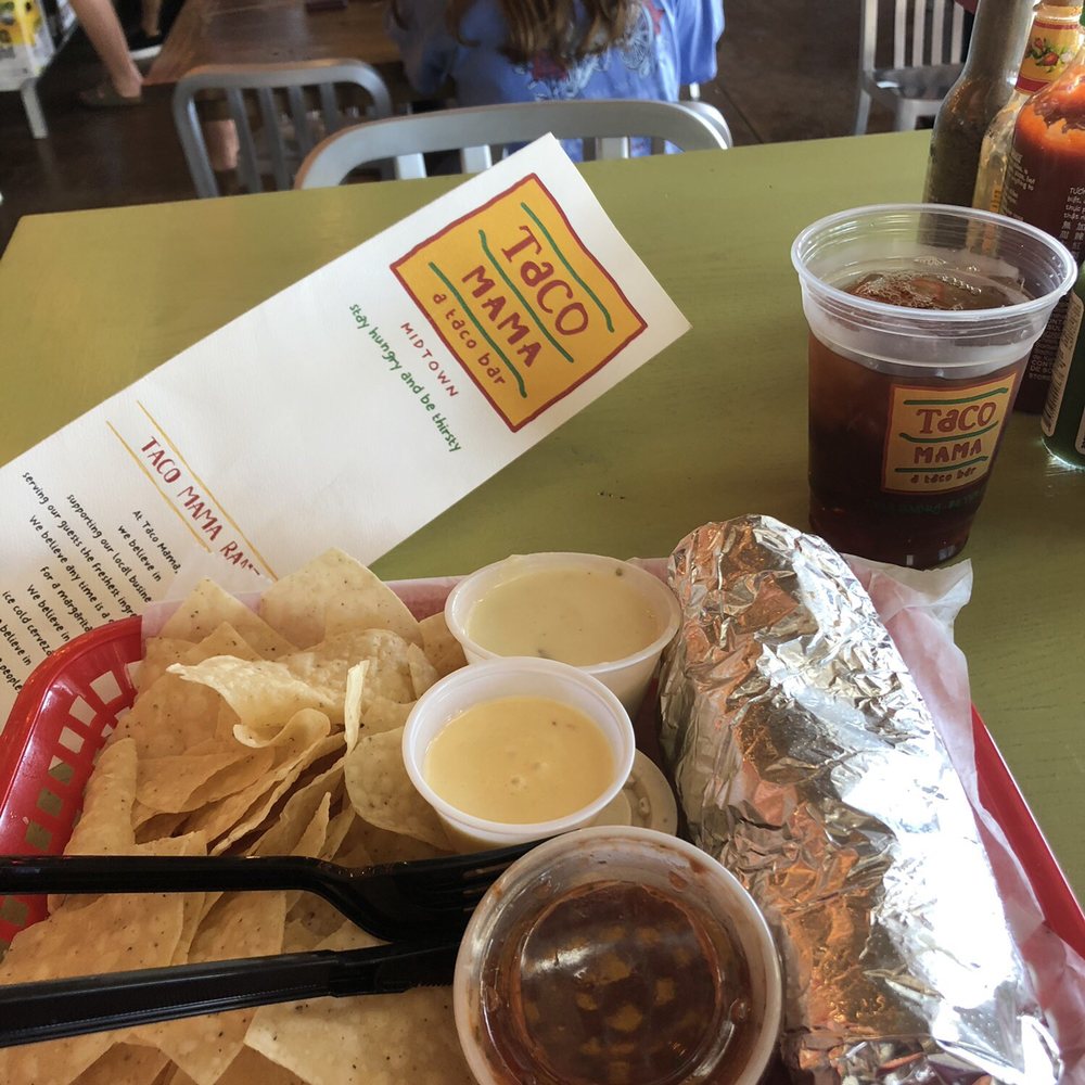 Taco Mama - Midtown Mobile - Burrito with chips, and a few sauces and queso as a side - Mexican Near Me - Mobile, Alabama Taco Mama - Midtown Mobile - Burrito with chips, and a few sauces and queso as a side - Mexican Near Me - Mobile, Alabama