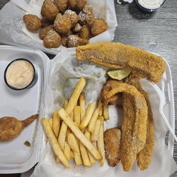 Captain La Fish Chicken And More - 4 huge pieces of fish and 3 stuffed shrimp. Also pictured are the mushrooms. - Seafood Near Me - Arlington, Texas