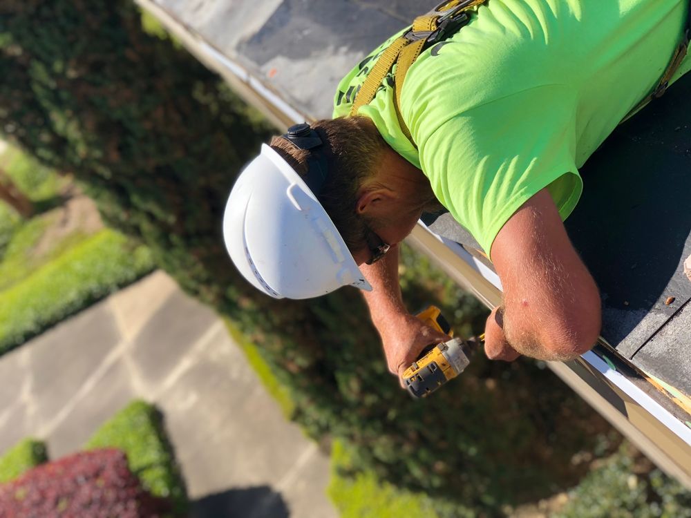 Slide of Centennial Roofing