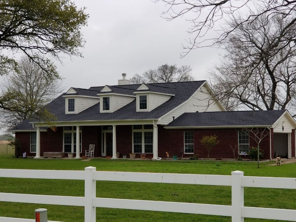 Slide of Pride of Texas Roof and Fence