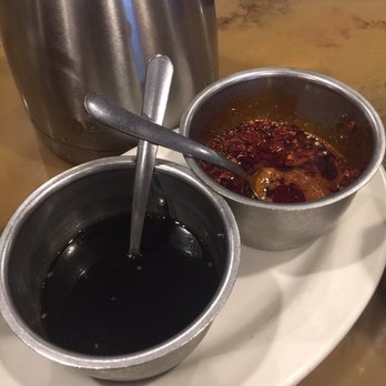 Yu's Mandarin - Ginger and chili oil dipping sauces for the fried pot stickers. - Chinese Near Me - Schaumburg, Illinois Yu's Mandarin - Ginger and chili oil dipping sauces for the fried pot stickers. - Chinese Near Me - Schaumburg, Illinois