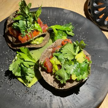 Colita - Tuna Tostada: raw tuna, avocado, sesame, tomato jam, cilantro, celery leaf - New American Near Me - Minneapolis, Minnesota