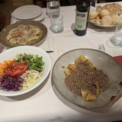 Ra Stua - Our dinner table, with ragú, beat ravioli, and side salad