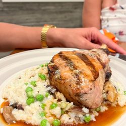 Charleston Harbor Fish House - Pork Chop over rice and peas. Delicious!