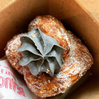 Beaucoup Bakery & Cafe - Cruffin with almond coconut whipped ganache and activated charcoal and cassis blueberry jam - Bakeries Near Me - Vancouver, British Columbia