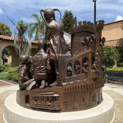 Rollins College - Backside of the statue showing the trolley and the Land of Make Believe.