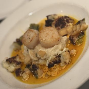Timpone's - Seared scallops in carrot butter, over celery purée - Italian Near Me - Urbana, Illinois Timpone's - Seared scallops in carrot butter, over celery purée - Italian Near Me - Urbana, Illinois
