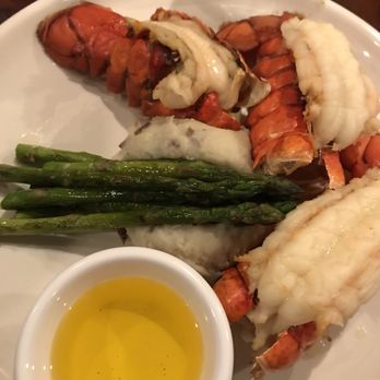 The Captain's Table - Twin lobster tails too small to justify market place, so they gave me a third. - Seafood Near Me - Punta Gorda, Florida The Captain's Table - Twin lobster tails too small to justify market place, so they gave me a third. - Seafood Near Me - Punta Gorda, Florida