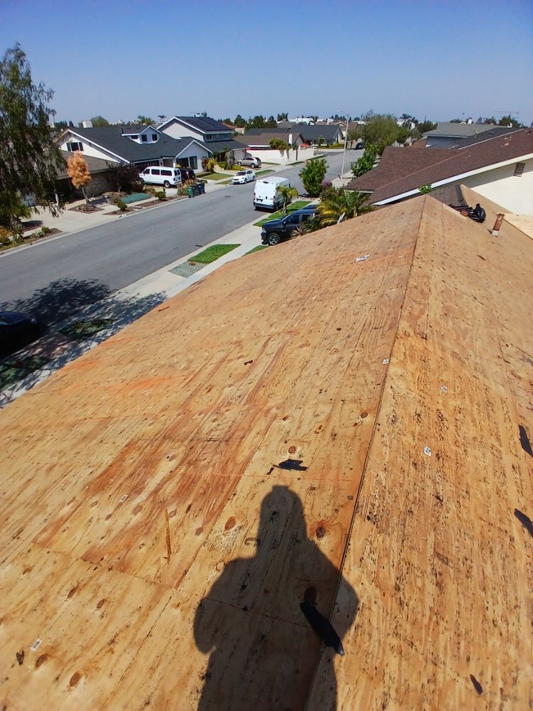 Slide of Reliance Roofing