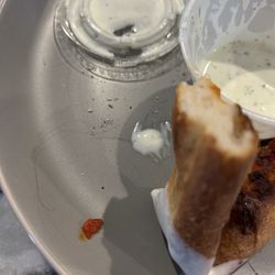 Mancino's Pizza & Grinders - Found this in the pizza crust.... If you're cooking wear a hairnet ...