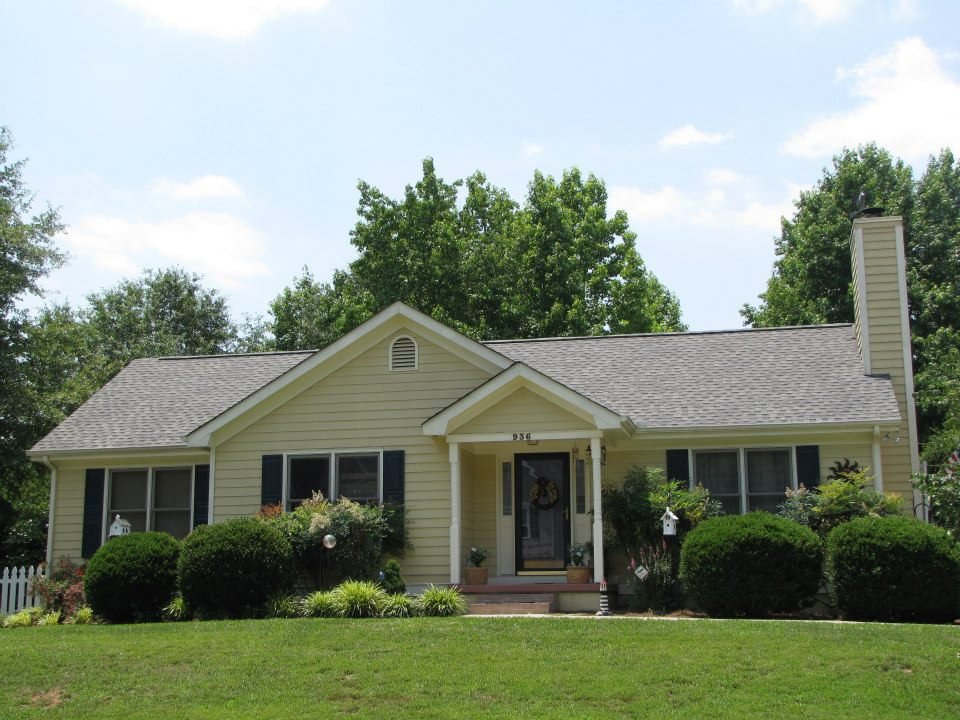 Slide of Hill Top Roofing