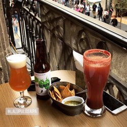 Hilaria - Beautiful view of the shopping centers, amazing bottle beer list, and flautas you can mix!
