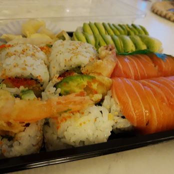 Tokyo Sushi - a variety of sushi on a black plate - Sushi Bars Near Me - Toronto, Ontario Tokyo Sushi - a variety of sushi on a black plate - Sushi Bars Near Me - Toronto, Ontario