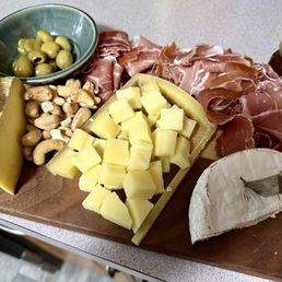 Jamon Serrano Riserva Compte Rarebird Mystery cheese  (Left to right)