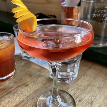 Botte Bar - Negroni Viola, Blood Orange Negroni in background - Cocktail Bars Near Me - Astoria, New York Botte Bar - Negroni Viola, Blood Orange Negroni in background - Cocktail Bars Near Me - Astoria, New York