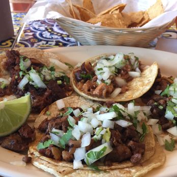 El Primo Restaurant - 2 steak tacos, 1 carnitas and 1 al pastor. $1 on Wednesday. - Mexican Near Me - Joliet, Illinois