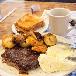 Sunshine Cafe - 8/13/22 another great breakfast. Chop steak eggs over medium sliced fried potatoes coffee wheat toast.