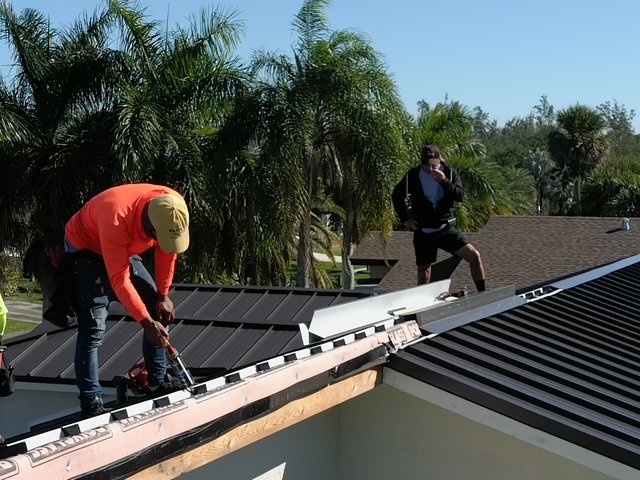 Slide of TNT Roofing