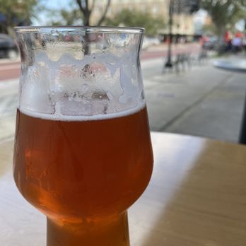 Deviant Wolfe Brewing - Drinking a Pale Ale people watching - Breweries Near Me - Sanford, Florida