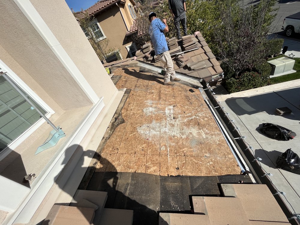 Slide of Steve’s Roofing Repair