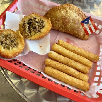 Melina’s Empanadas - Relleno de papa (amazing beef and potato ball), yucca fries, and a chicken/cheese empanada - Empanadas Near Me - Bunnell, Florida Melina’s Empanadas - Relleno de papa (amazing beef and potato ball), yucca fries, and a chicken/cheese empanada - Empanadas Near Me - Bunnell, Florida