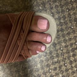 SNS Nails & Spa - Uneven trim work, polish outside of nail area, cuticles look terrible.