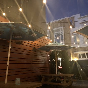 Bodega - Outdoor eating space - Sports Bars Near Me - Charleston, South Carolina