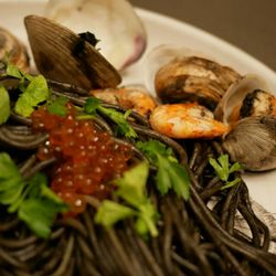Mr. Jones Supper Club - Squid ink spaghetti with shrimp and clams, topped with ikura (salmon roe) and cilantro