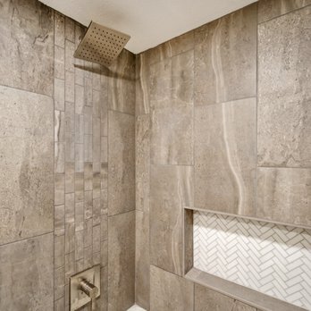 Venus Homes - a bathtub and shower in a bathroom - General Contractors Near Me - Gilbert, Arizona Venus Homes - a bathtub and shower in a bathroom - General Contractors Near Me - Gilbert, Arizona