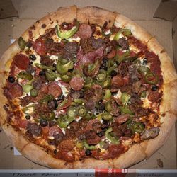 Romas Pizzeria - Awesome Pizza.. Loaded with Toppings!!