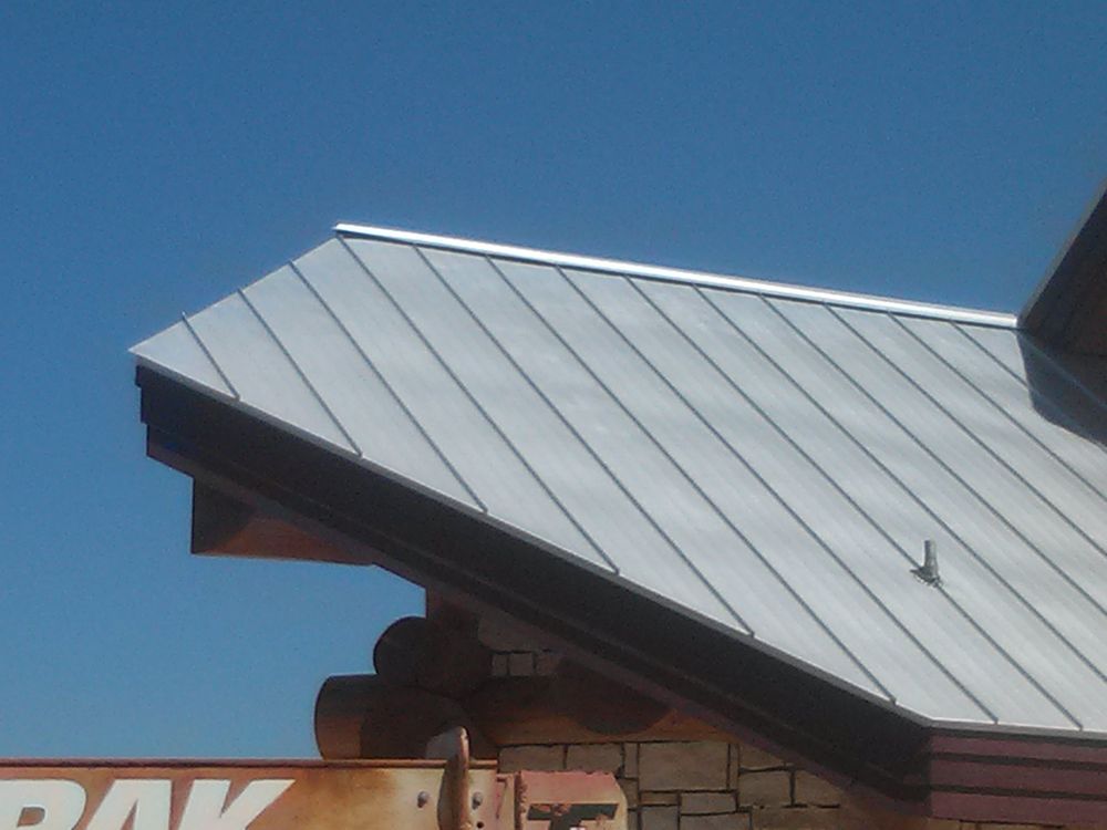 Slide of Hackett's Custom Siding and Metal Roofs