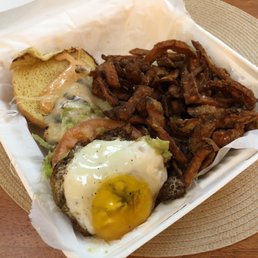 The Mama & Baby: grilled chicken breast, avocado, bacon, provolone, fried egg, chipotle maya.