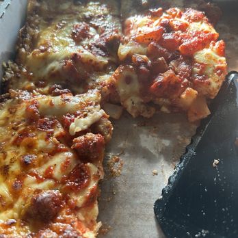 Loui's Pizza - Part of the large pepperoni sausage onion and pineapple. Delish! - Pizza Near Me - Hazel Park, Michigan Loui's Pizza - Part of the large pepperoni sausage onion and pineapple. Delish! - Pizza Near Me - Hazel Park, Michigan