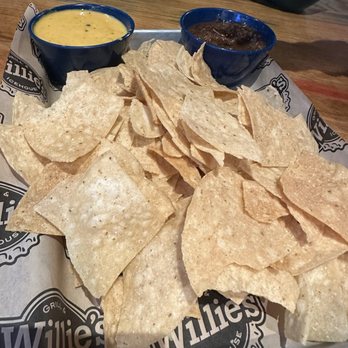 Willie's Grill & Icehouse - Chips with Queso and salsa - American Near Me - Pflugerville, Texas Willie's Grill & Icehouse - Chips with Queso and salsa - American Near Me - Pflugerville, Texas