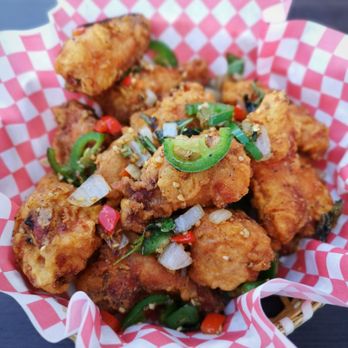 Green Bites Dumpling & Tea Bar - Green Bites - Crispy Chicken Wings garnished with jalapeño, red pepper, onion and basil. Ultra crispy and well-seasoned. Must get! - Chinese Near Me - Brampton, Ontario
