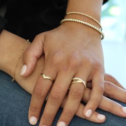 Two fashion rings and two diamond and gold bracelets