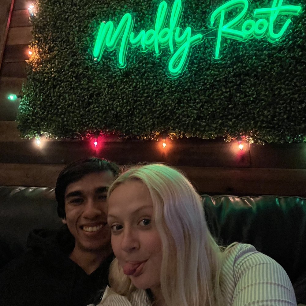 The Muddy Root - the neon iconic sign with my lover - Coffee & Tea Near Me - Orlando, Florida The Muddy Root - the neon iconic sign with my lover - Coffee & Tea Near Me - Orlando, Florida