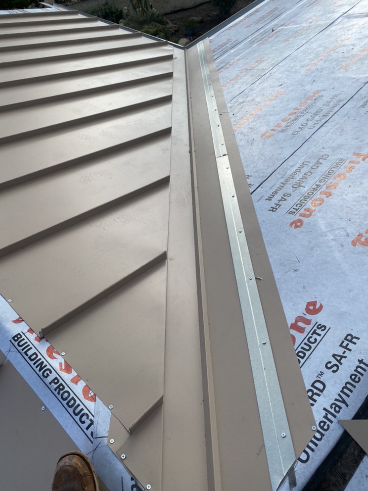 Slide of Robles Roofing