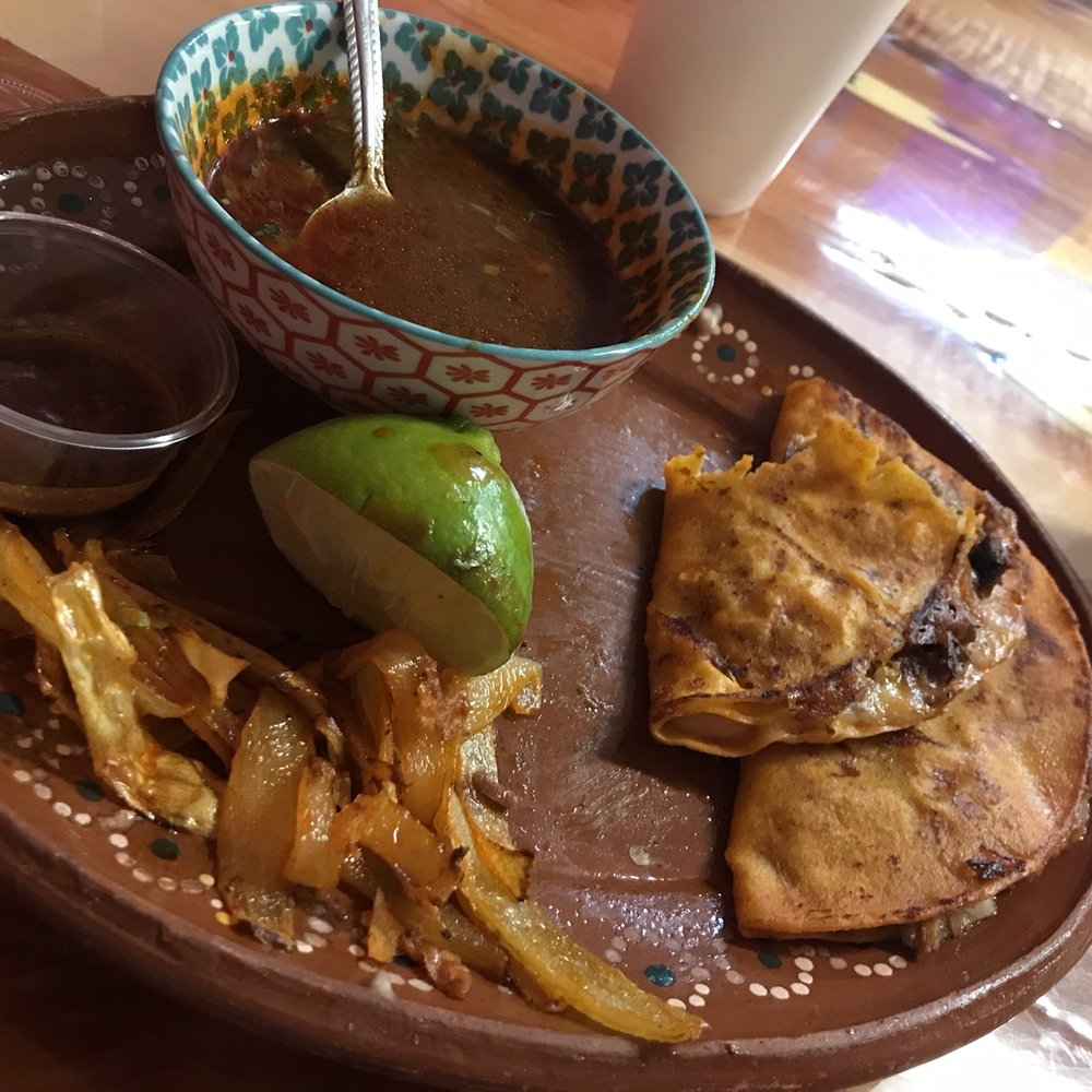 Quessa Birria with super spicy sauce and the trademark dip with a side of beans! Quessa Birria with super spicy sauce and the trademark dip with a side of beans!