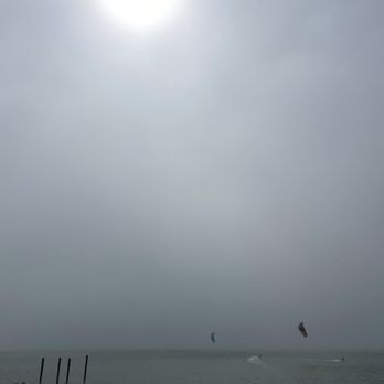 Good Winds Restaurant - View of the kite surfers was entertaining on a cold/foggy day. - Wine Bars Near Me - Rodanthe, North Carolina