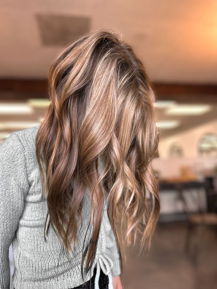 Hairapeutic by Sara Logo