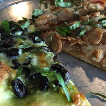 Ghiringhelli's Pizzeria - 1/2 pesto, 1/2 red sauce, everyone is happy. - Pizza Near Me - Fairfax, California Ghiringhelli's Pizzeria - 1/2 pesto, 1/2 red sauce, everyone is happy. - Pizza Near Me - Fairfax, California