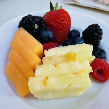 Makahiki - Sliced fruit and berries come with breakfast - Bars Near Me - Kapolei, Hawaii Makahiki - Sliced fruit and berries come with breakfast - Bars Near Me - Kapolei, Hawaii